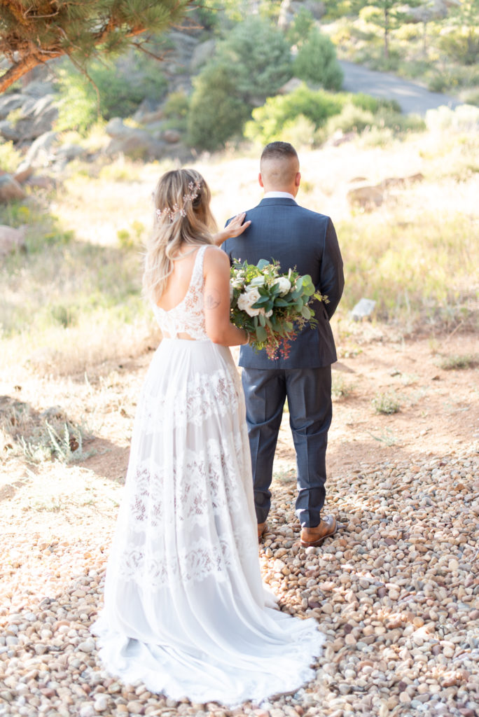 Estes Park, Colorado summer elopement bride and groom first look