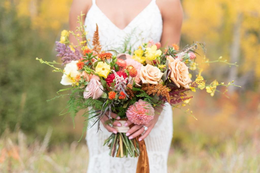Rocky Mountain Fall Elopement|Painted Primrose bright wedding bouquet 