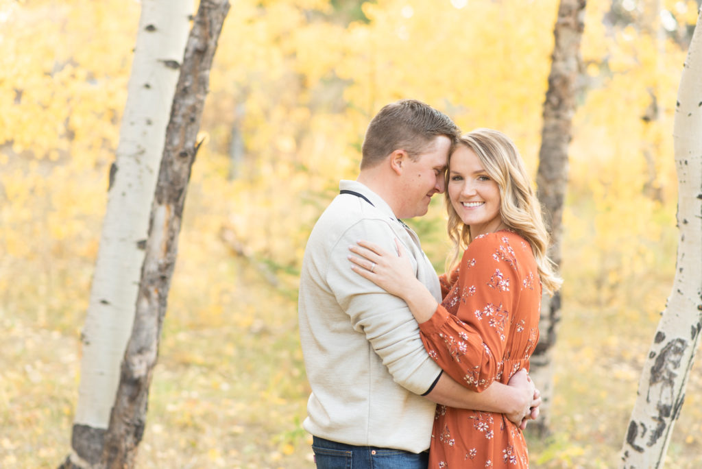 Fall Colorado engagement session-colorful aspen foliage- Meyer Ranch Park
